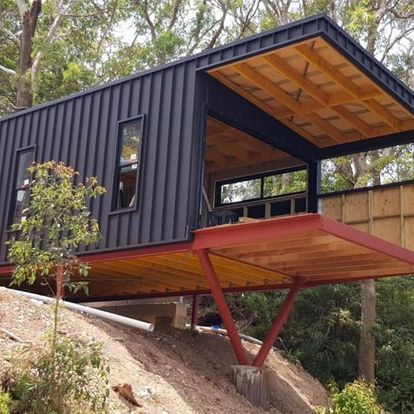 Parrish Group: a house under construction with a flat roof